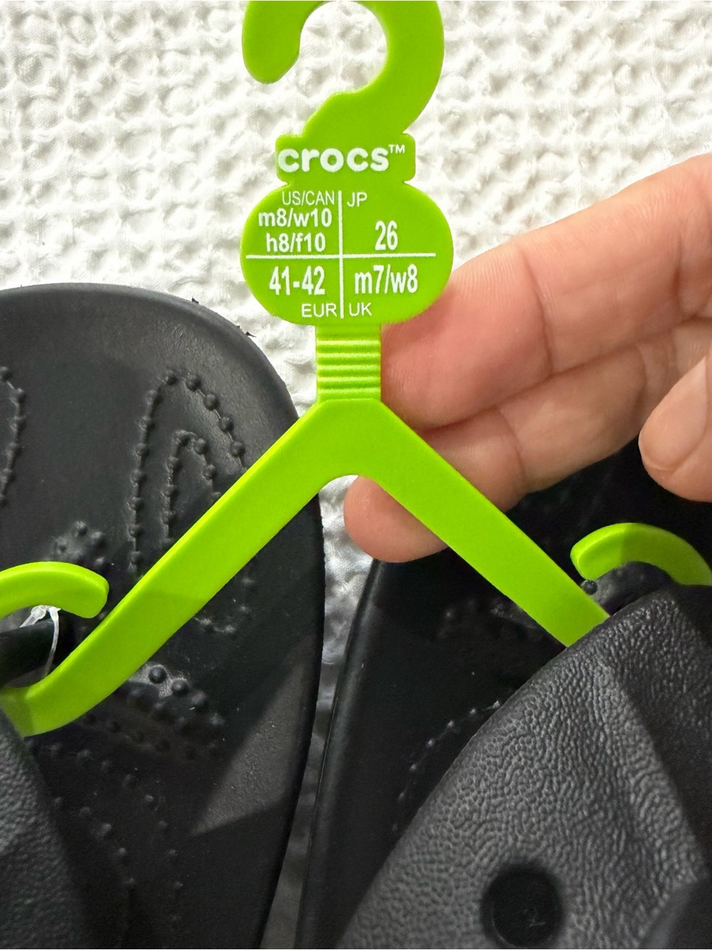 CROCS women’s Black Flip Sandals with Logo Strap - Picture 4 of 4
